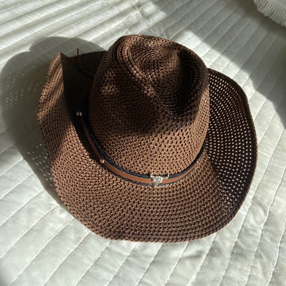 Brown straw cowboy hat